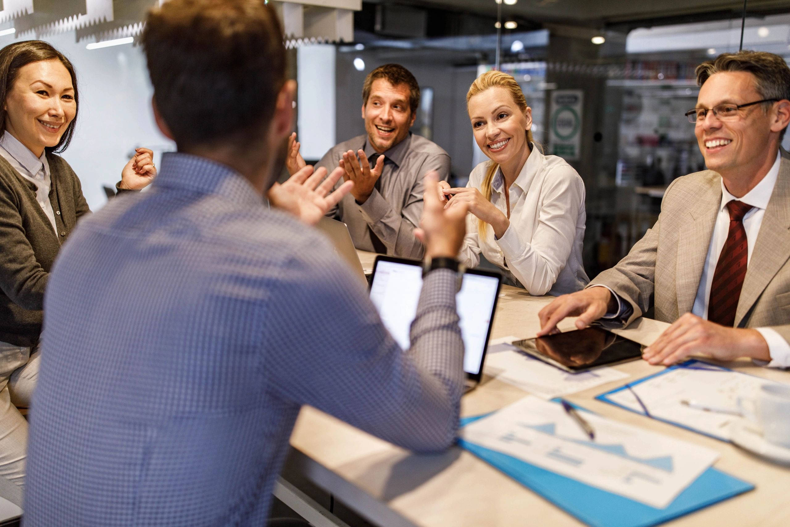 Team meeting in an office representing managed support and collaboration
