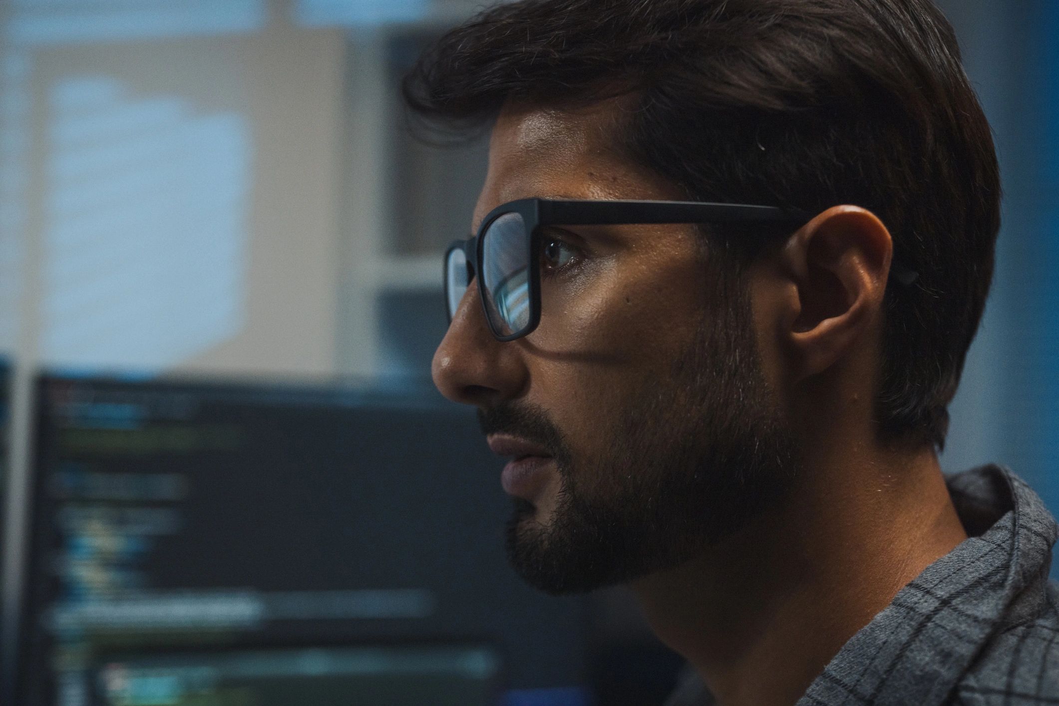 Software developer working late in an office